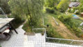 Sicht vom DG auf die Terrasse im EG und in den Gar