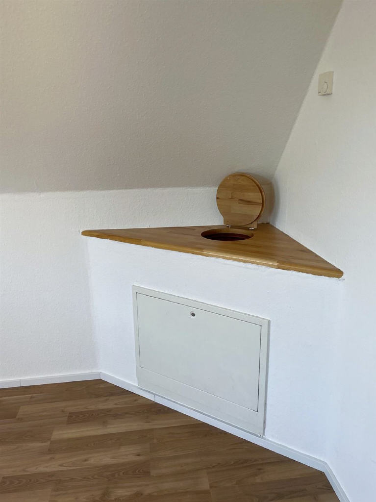 mit Wäscheabwurf